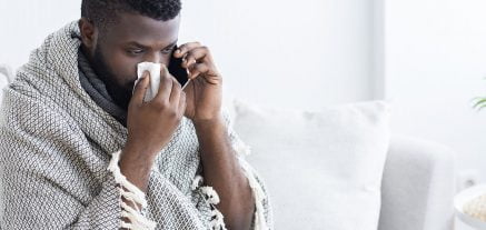 24-7 Medcare Sick man calling on phone to doctor